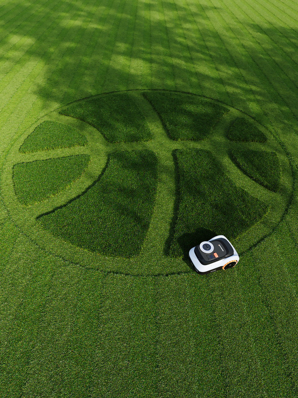 Segway Navimow i105E robot tondeuse dessinant un ballon de basket.
